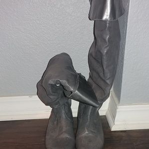 Knee high silver boots
